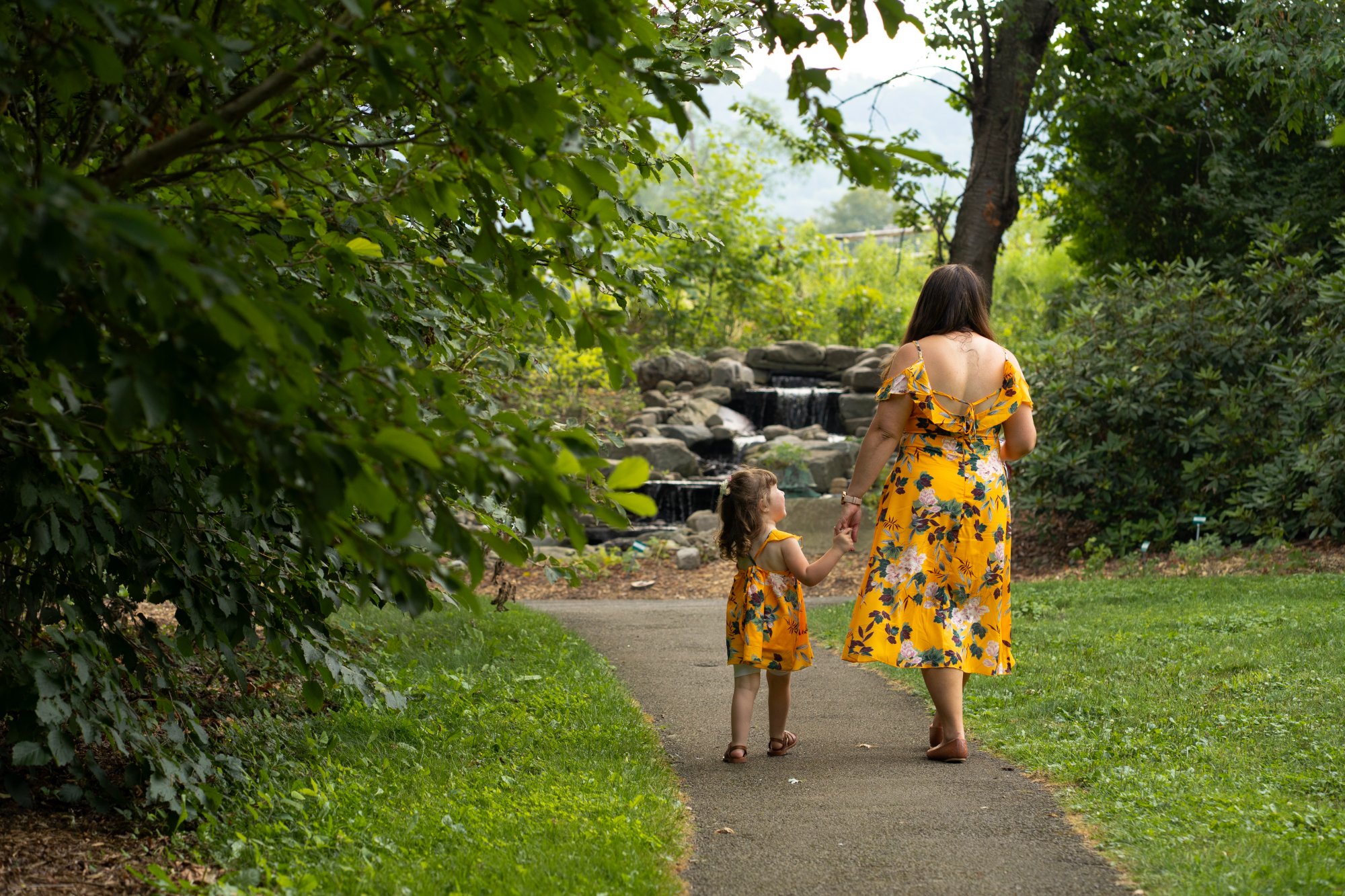Family walk in garden